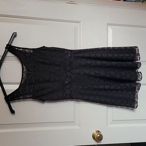 Women's/juniors black dress, size 7. Haltertop sleeves.